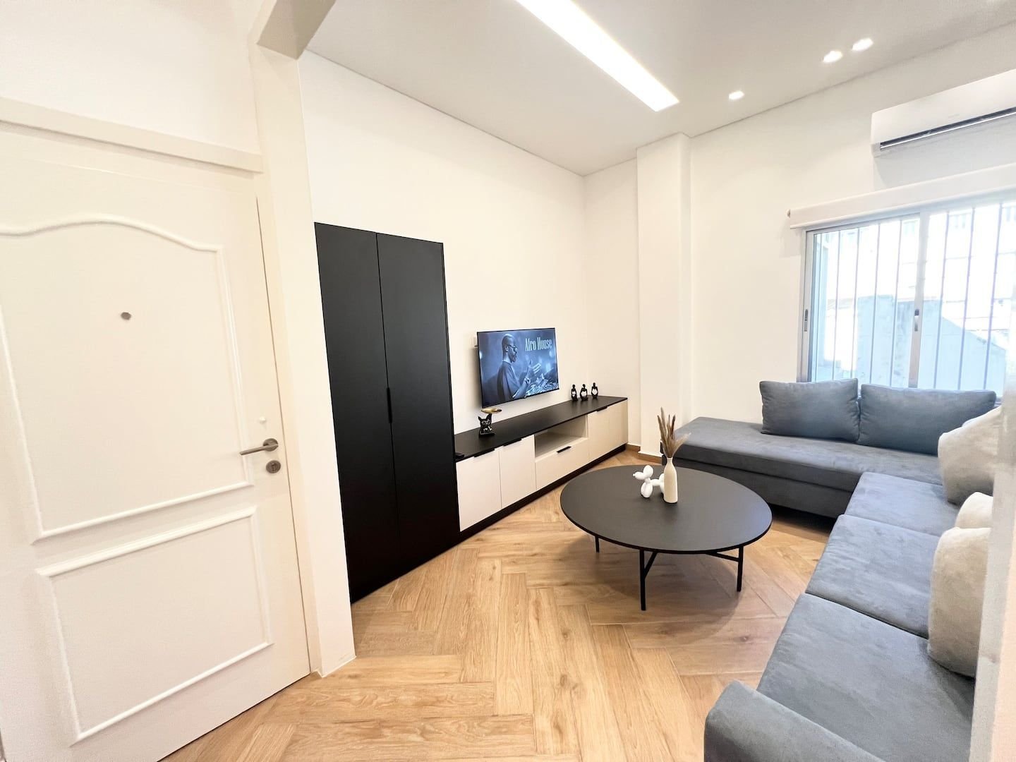 Living room seen from the entrance, Spacious 1-Bedroom in Geitawi, Achrafieh