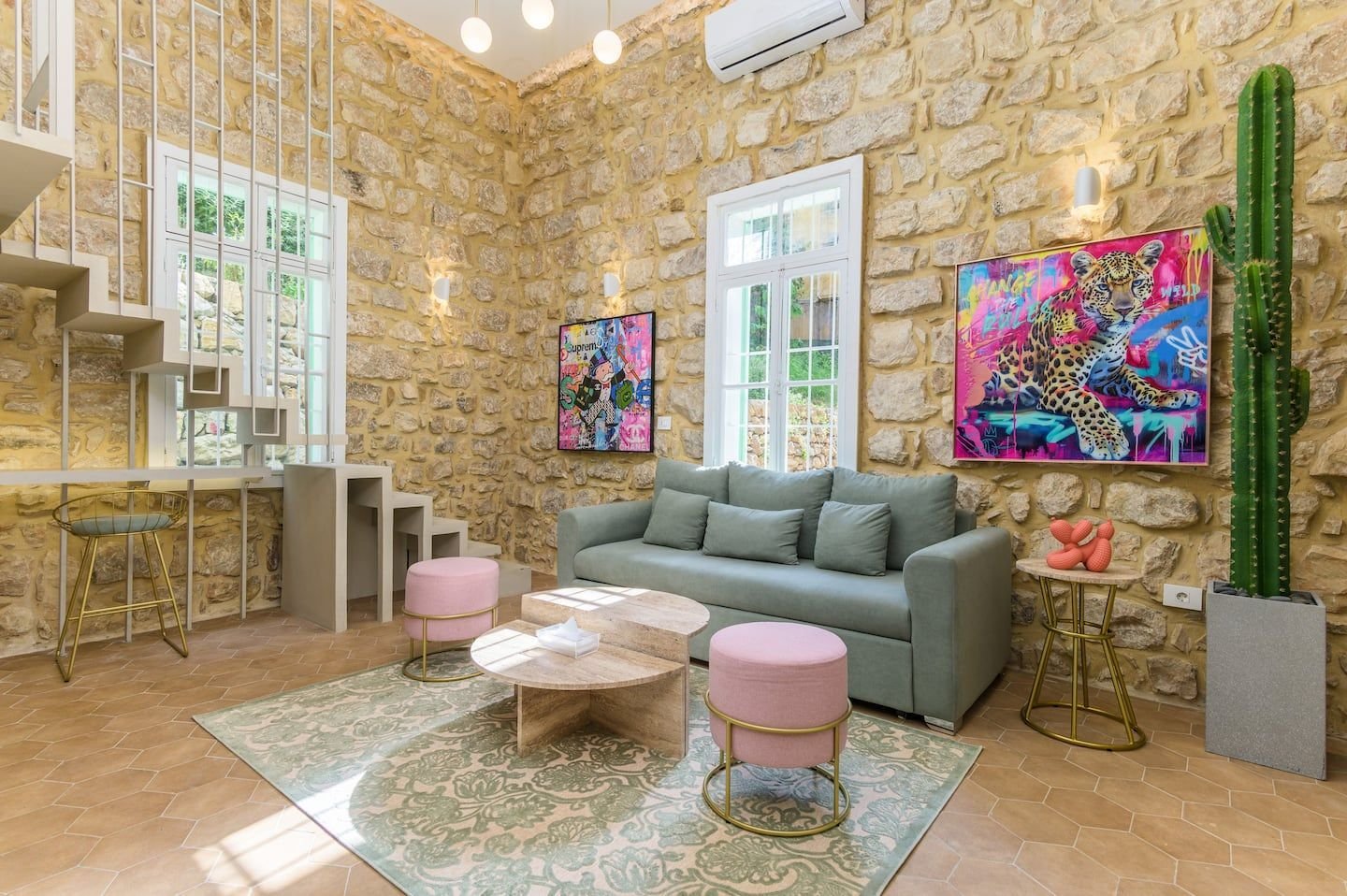 Living room with exposed stone walls, Heritage Loft 2-Bedroom in Achrafieh