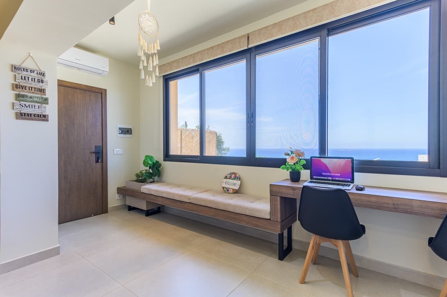 Desk by a sea-view window, Stitch Studio in Batroun with Garden & Sea View