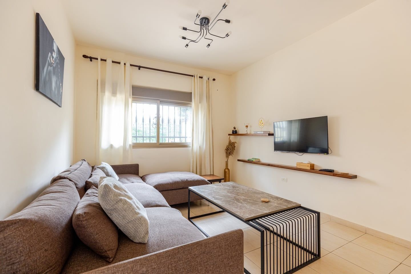 Living room with smart TV, Modern 1-Bedroom with Private Entrance & Terrace