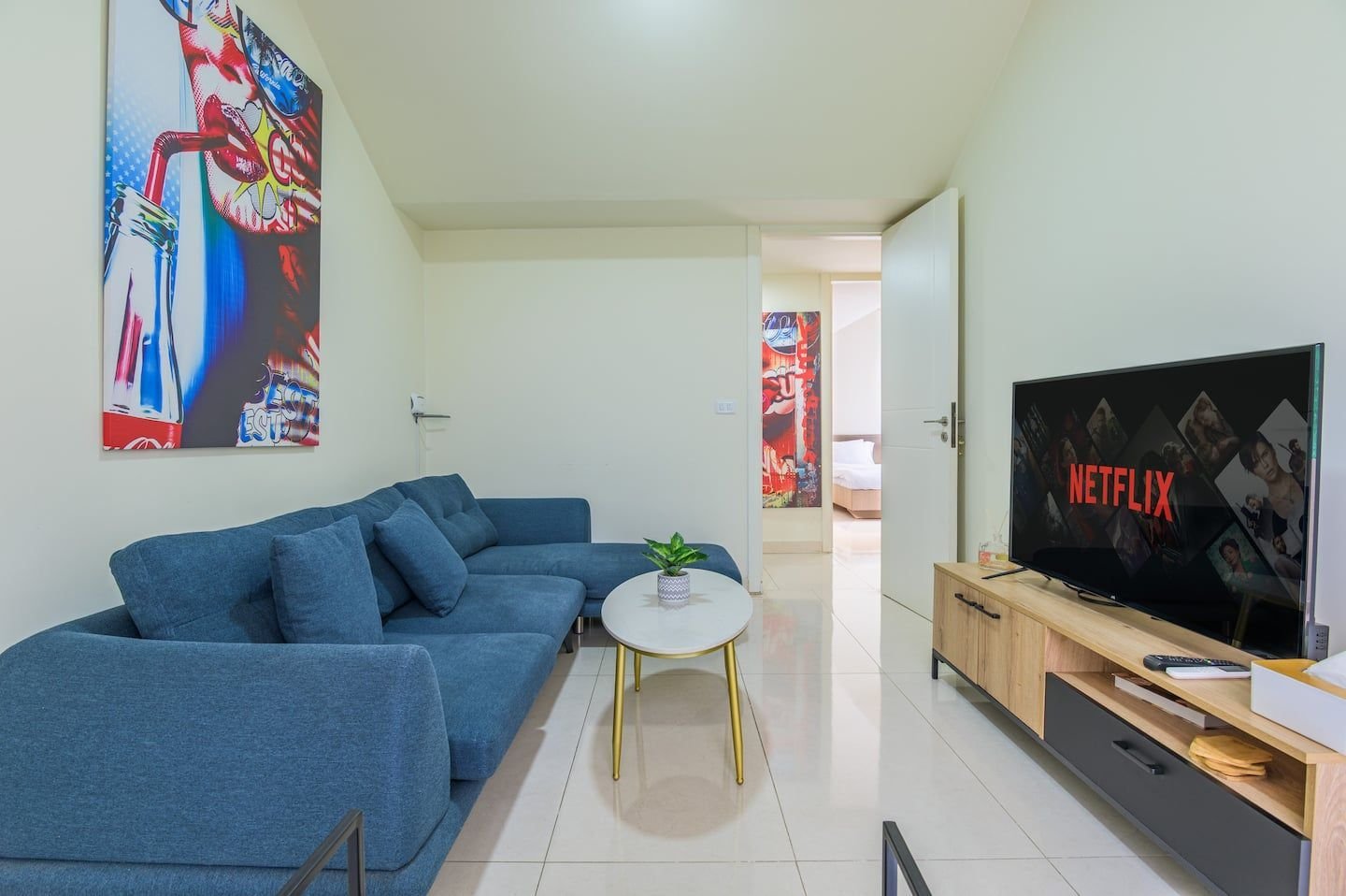 Living room with smart TV, Modern Rooftop 1-Bedroom in Bauchrieh