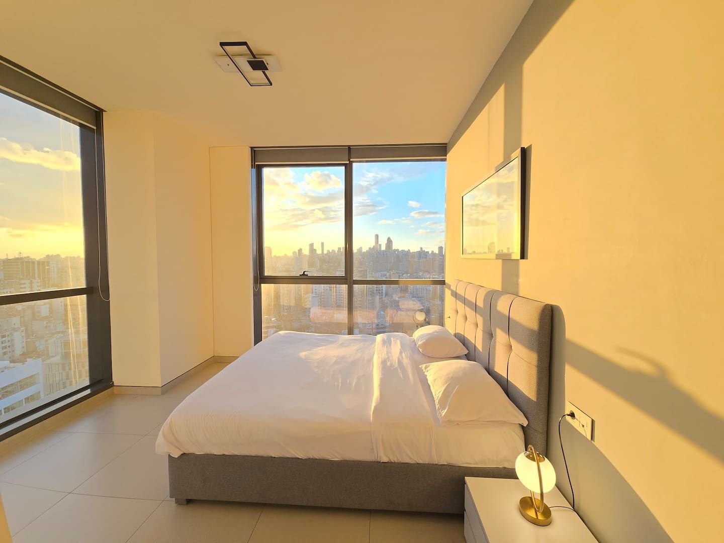 Bedroom with floor-to-ceiling windows, City Skyline 3-Bedroom with Pool, Gym & Playground