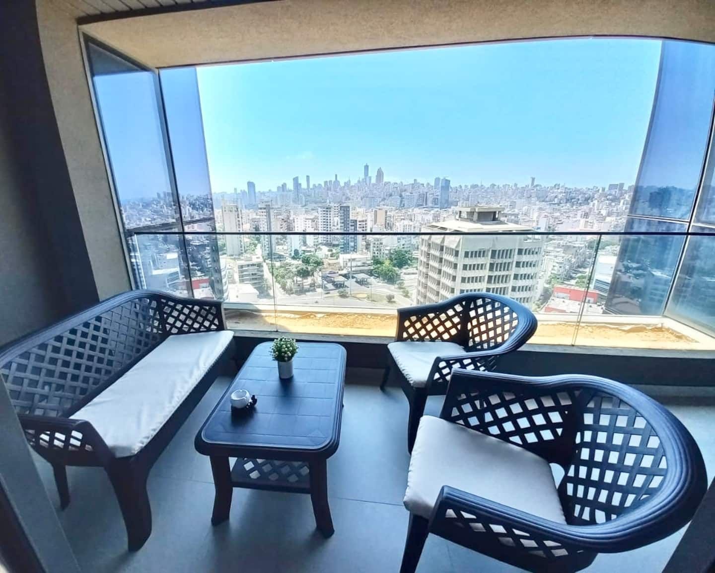 Balcony with panoramic skyline view, City Skyline 3-Bedroom with Pool, Gym & Playground