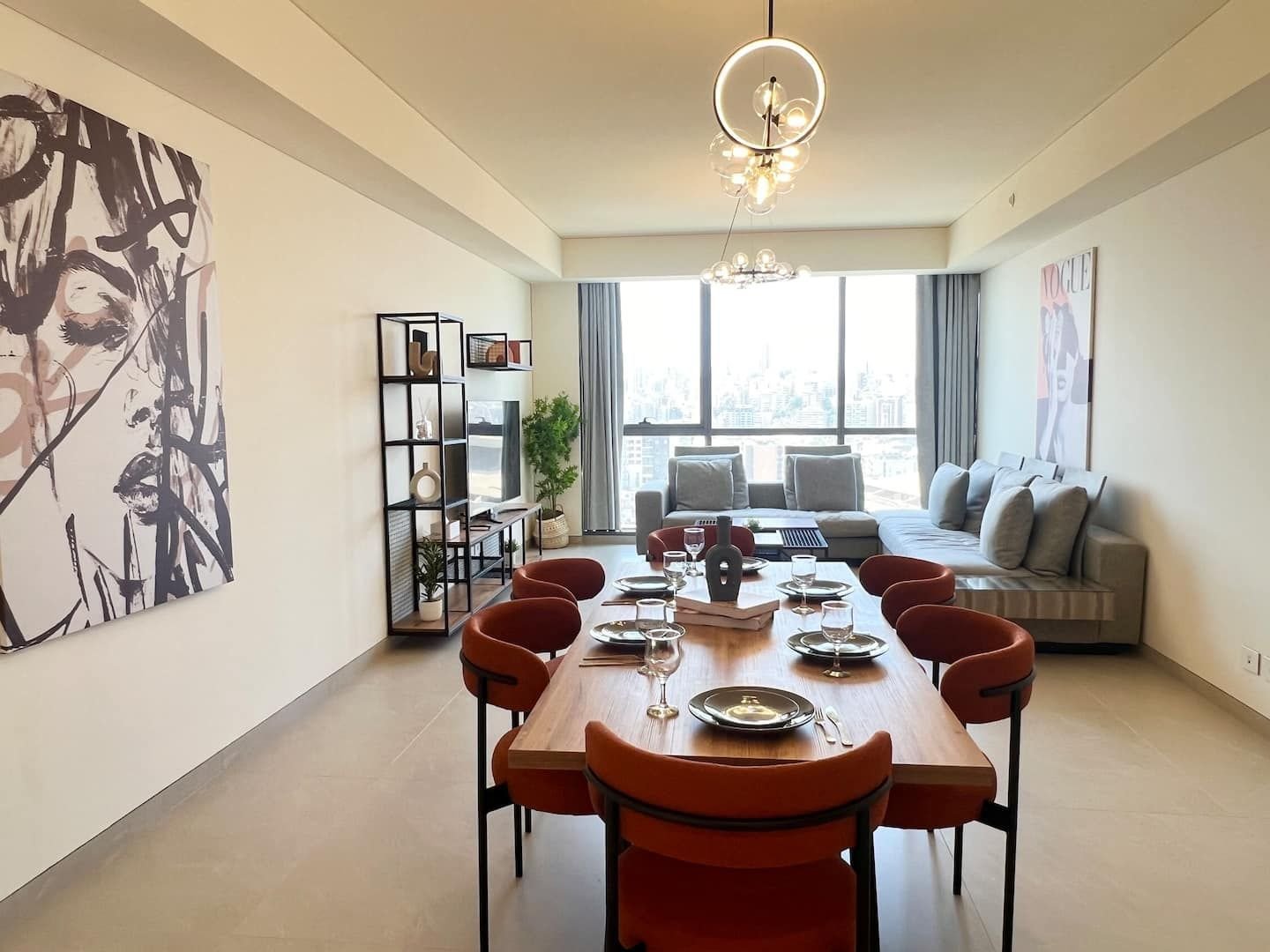 Dining table by the window, Cityscape 2-Bedroom with Pool, Gym & Playground