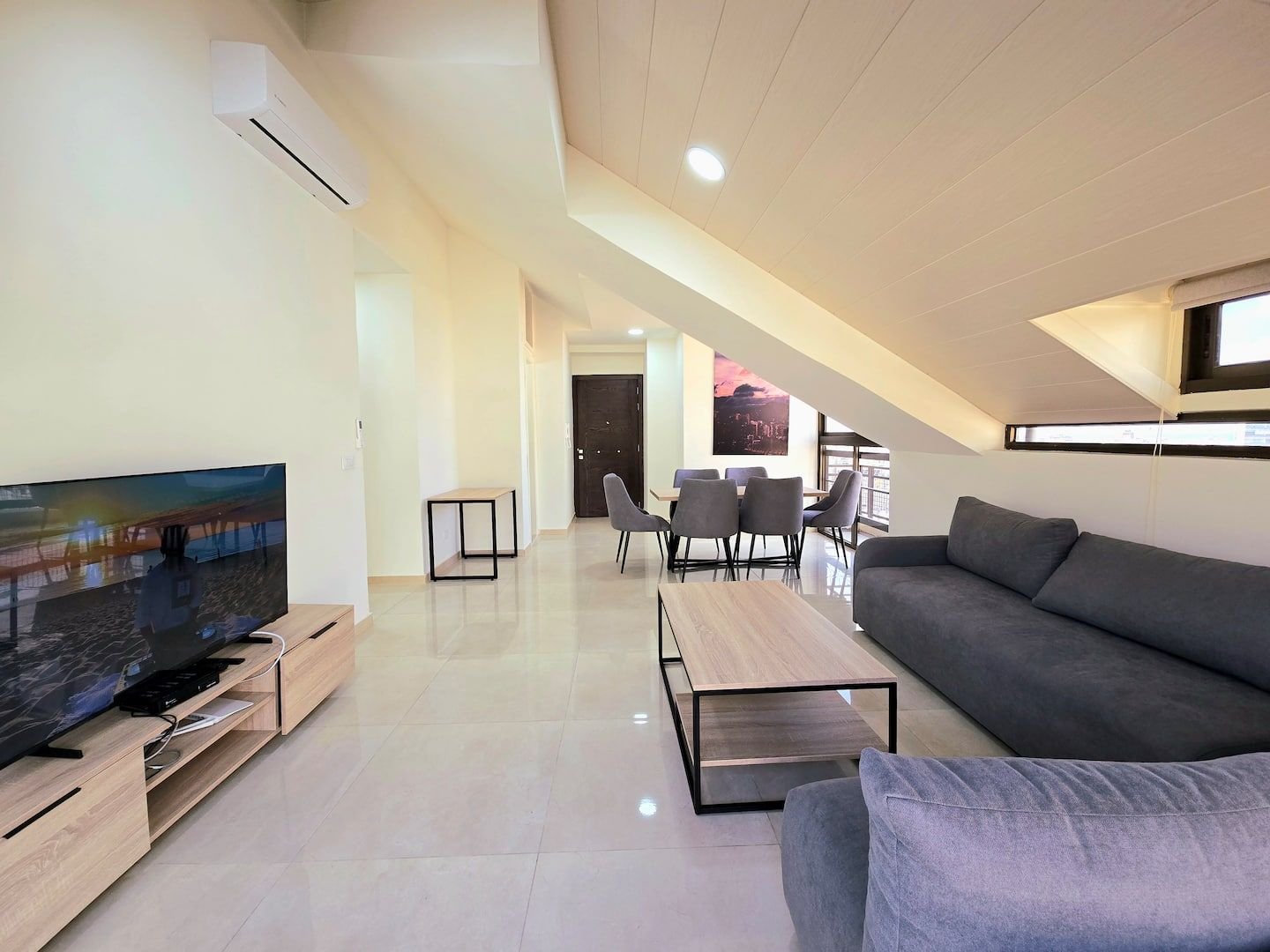 Living room with sofa and TV, Dekwaneh Rooftop 1-Bedroom with Private Balcony