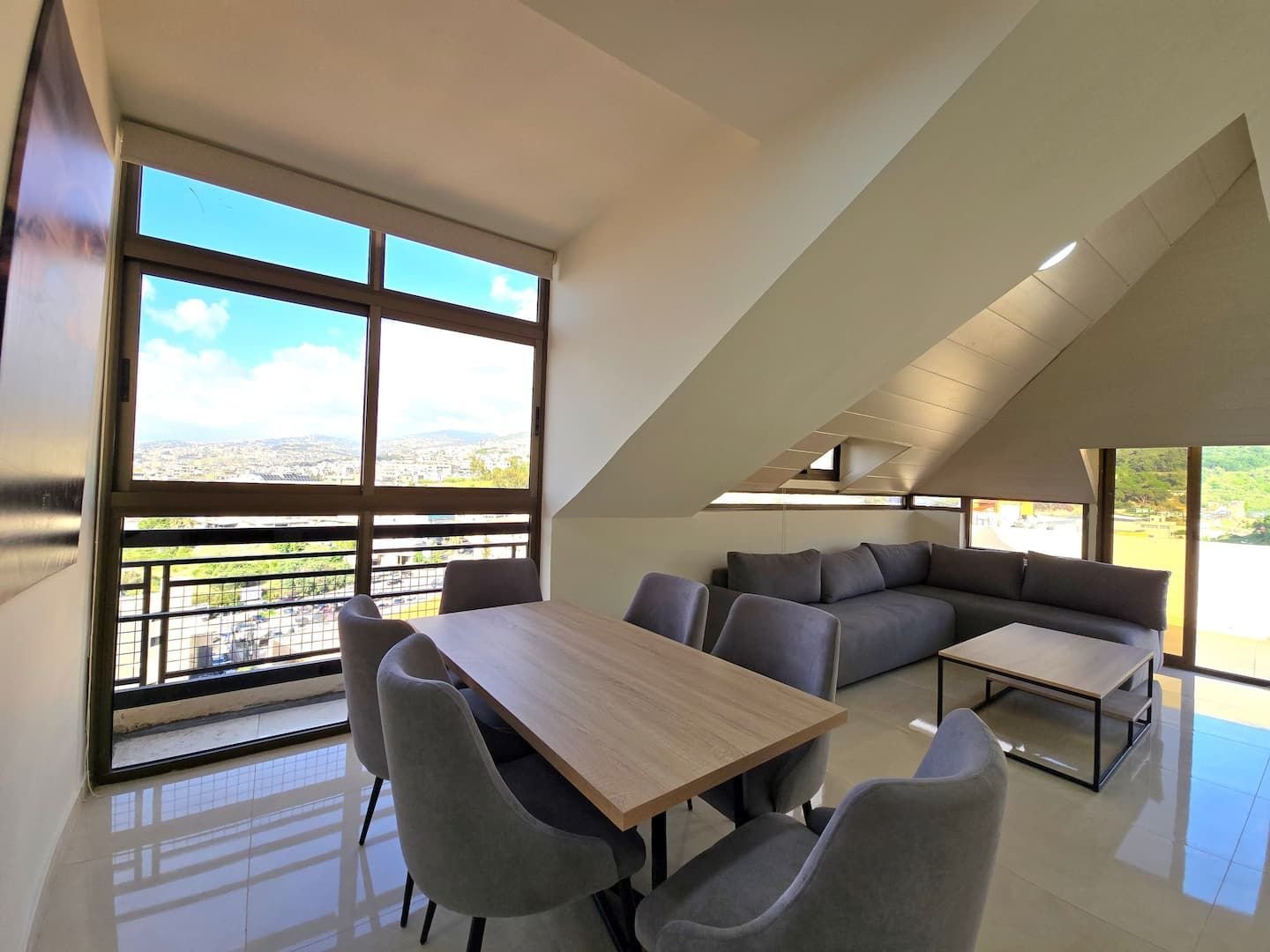 Rooftop dining and living area with views, Dekwaneh Rooftop 1-Bedroom with Private Balcony