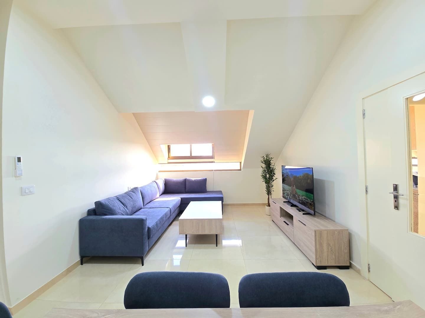 Living room with sofa and TV, Dekwaneh Rooftop 2-Bedroom with Balcony