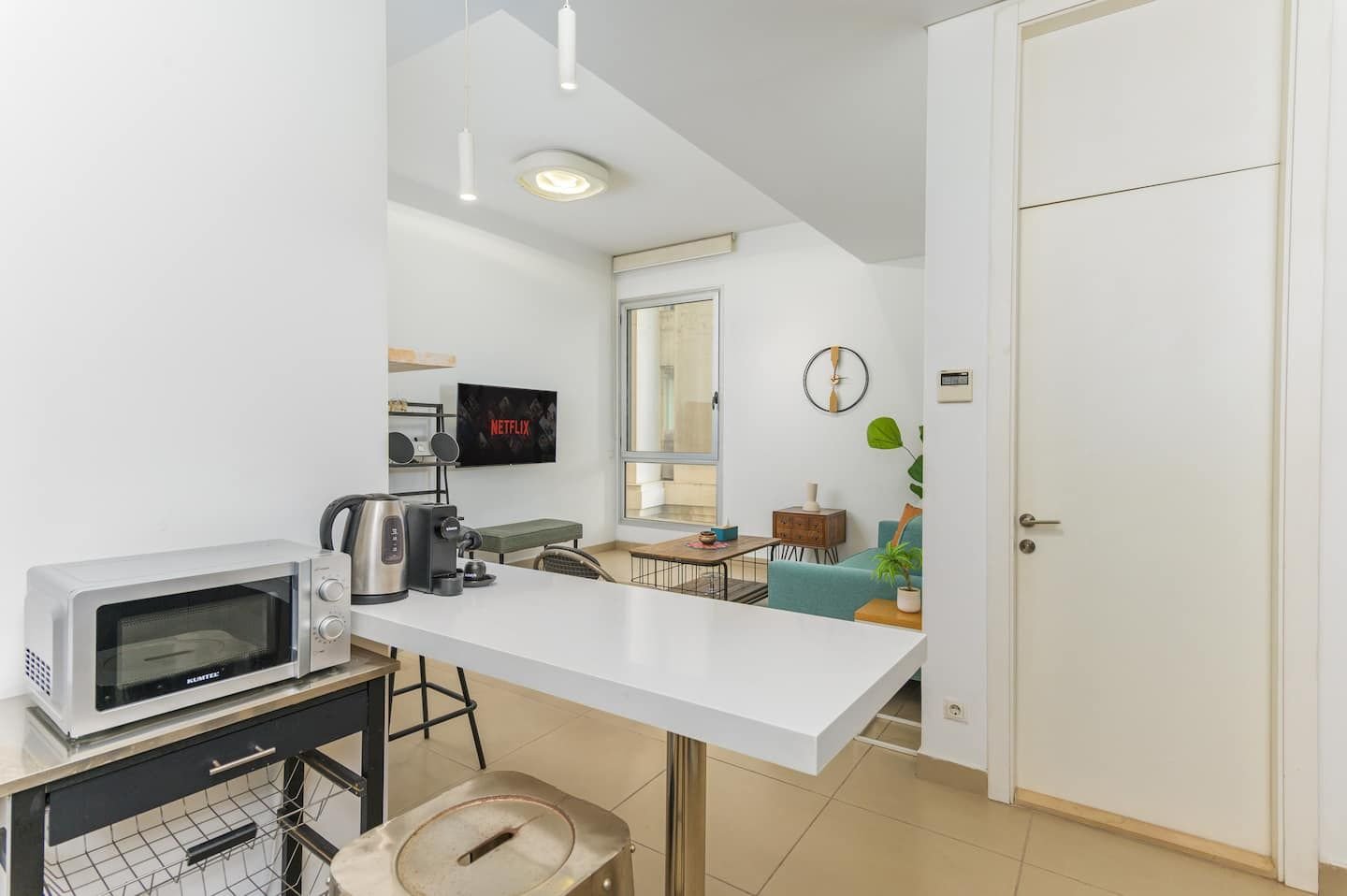 Kitchenette with breakfast counter, Downtown Saifi 1-Bedroom with Pool & Bathtub