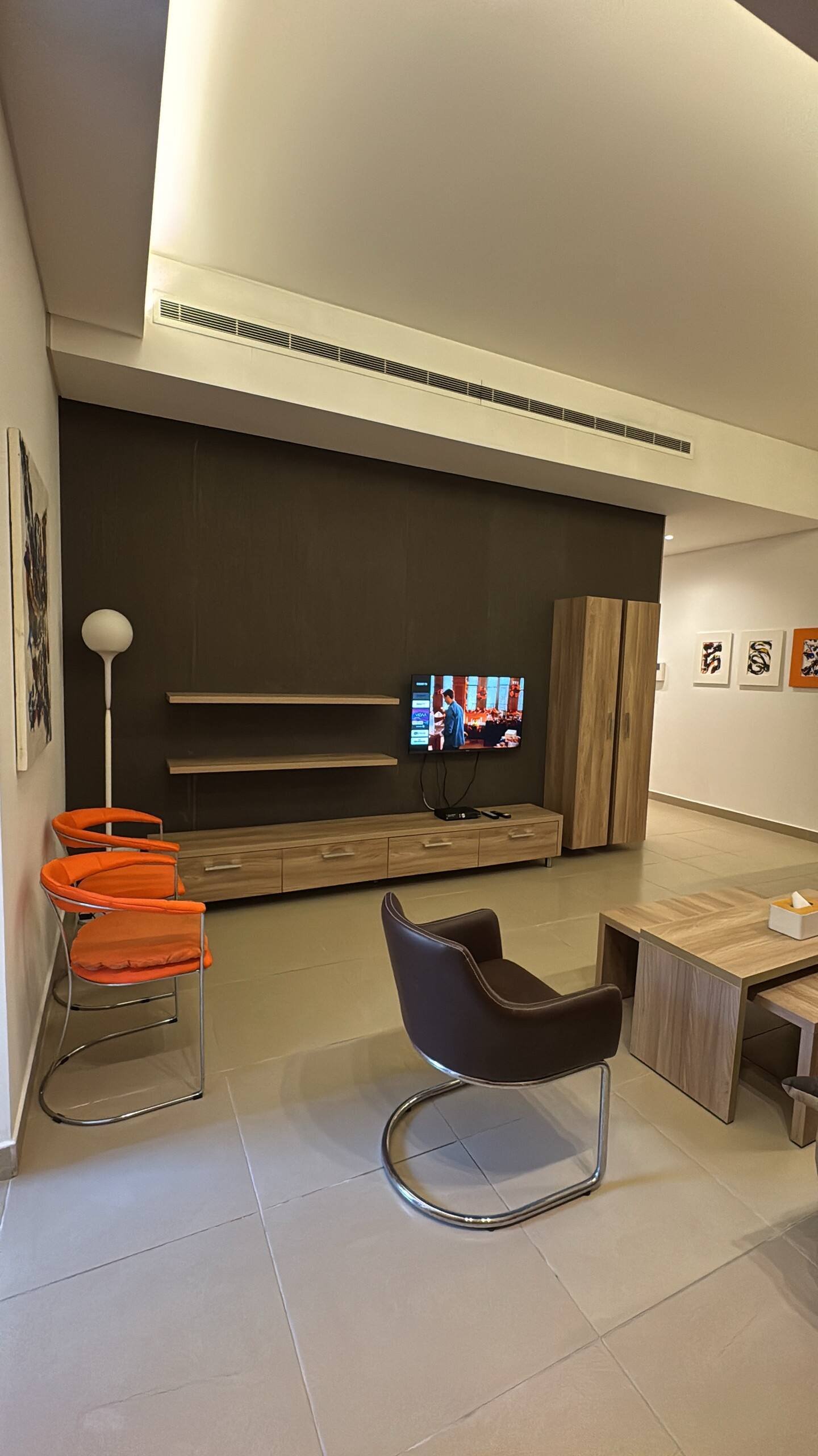 Living room with smart TV, Saifi 1-Bedroom with Heated Pool, Gym & Parking