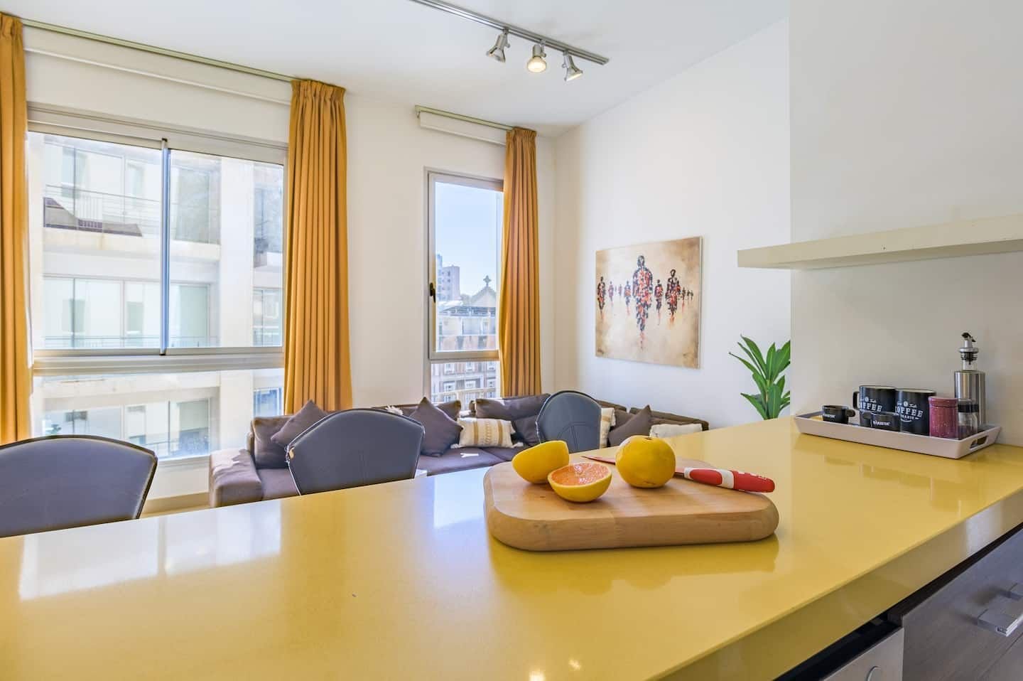 Kitchen counter looking onto the living room, Modern Saifi 1-Bedroom with Heated Pool
