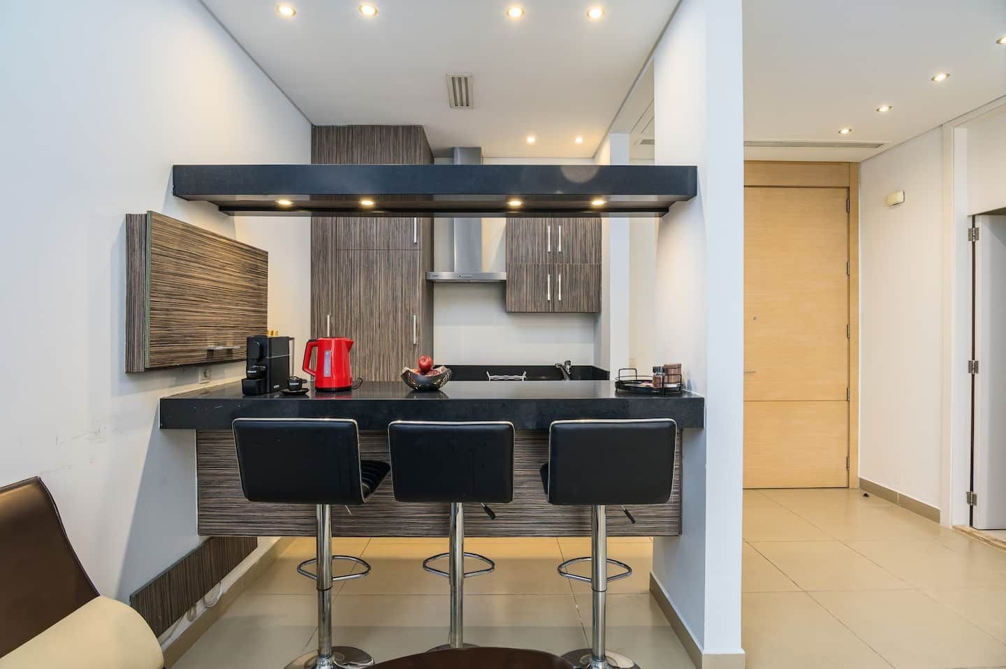 Kitchen with breakfast bar, Central 1-Bedroom with Pool & Gym