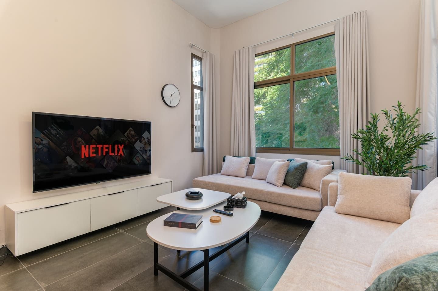 Living room with smart TV, Flat 1B (green interior) at Saifi 300, Tabaris