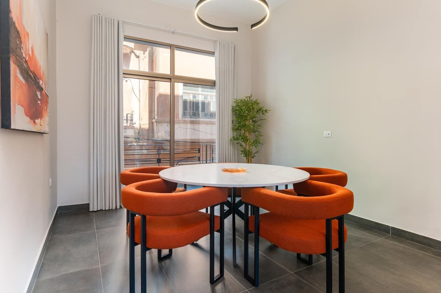 Dining table with red chairs, Flat 3A (red interior) at Saifi 300, Tabaris